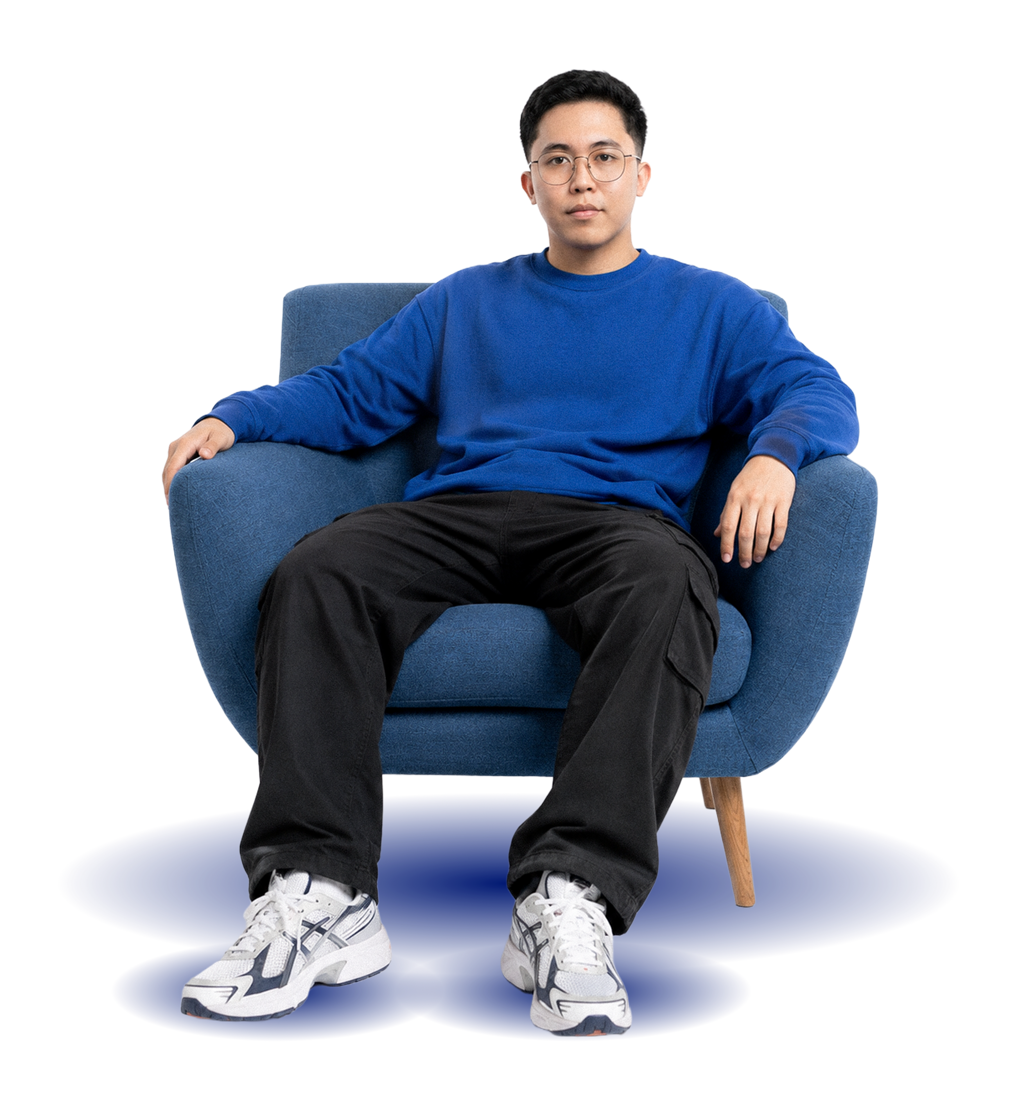 Jhunly Tapaya sitting in a blue chair
